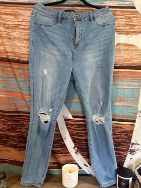 Fashion Nova Light Blue Distressed Skinny Jeans